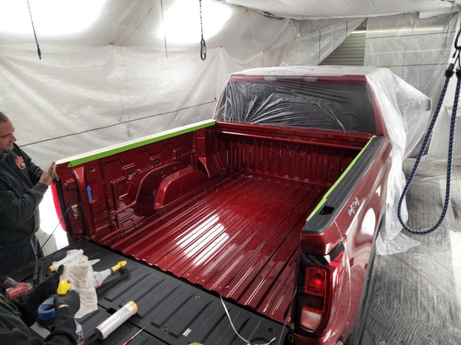 Red Truck Bed before spray on Bed-liner.