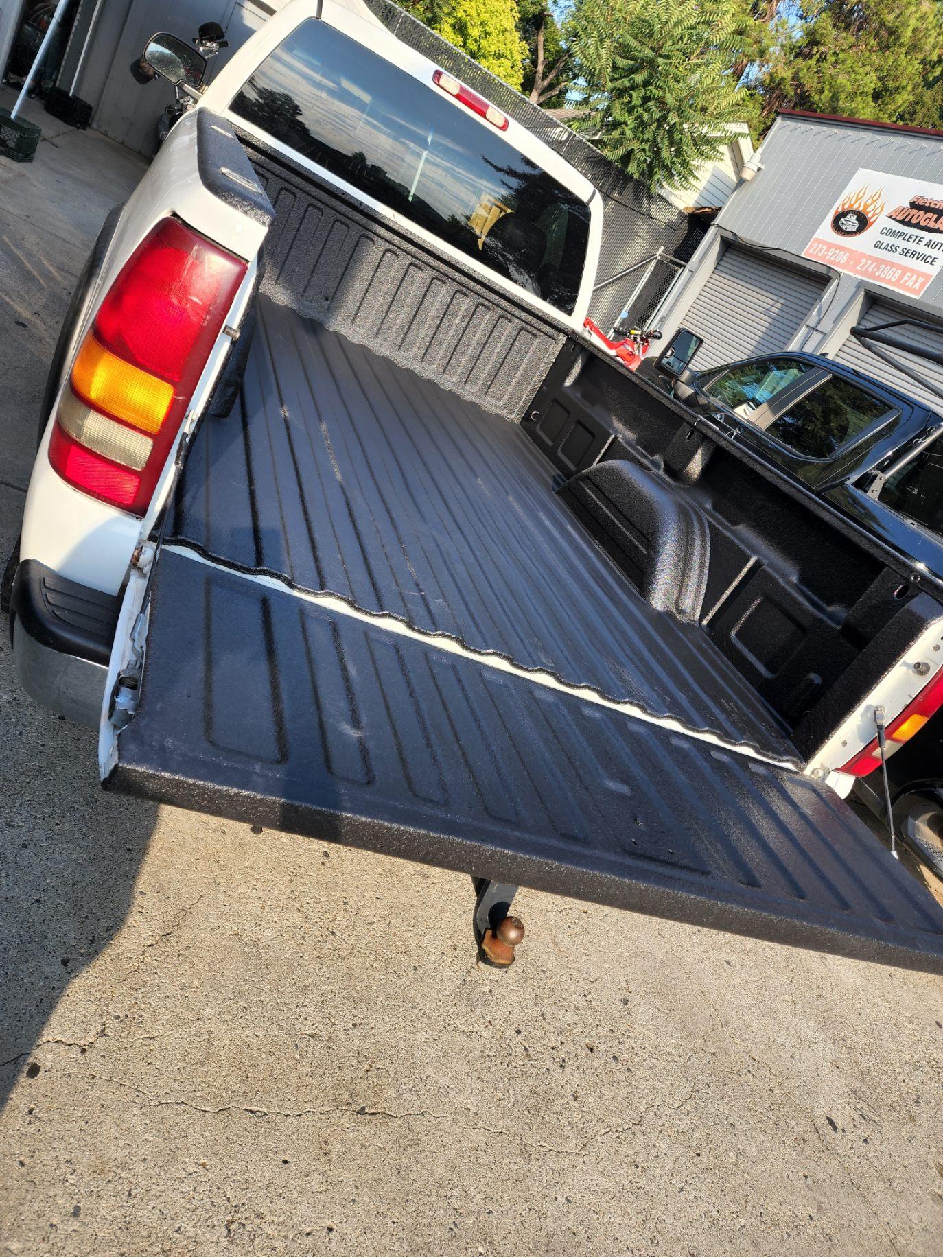 White Truck Bed after spray on Bed-liner.